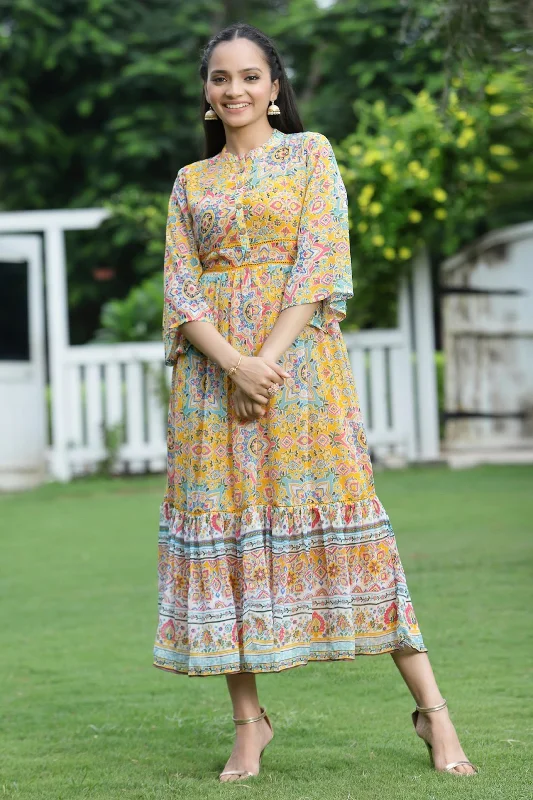 Jashvi Mustard Geometric Printed Chiffon Tiered Maxi Dress With Buttons. Elegant Maxi Dress with Drapes Jashvi Mustard Geometric Printed Chiffon Tiered Maxi Dress With Buttons. Elegant Maxi Dress with Drapes